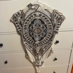 Sheer bodysuit worn once for a Halloween costume. From Amazon size small!